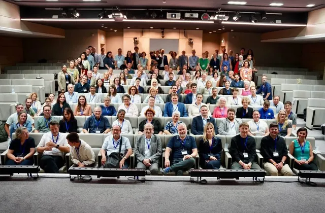 Attendees of the 14th ATP1A3 Symposium in a lecture hall in Paris