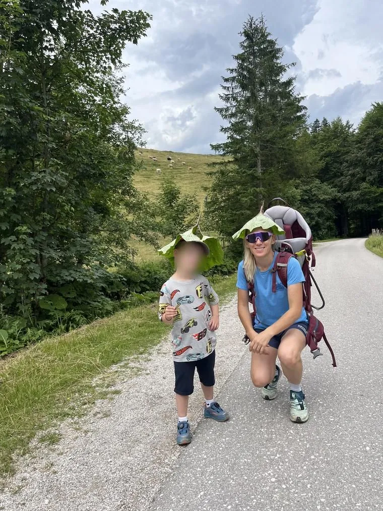 Verena hiking with Moritz, Jakob in the carrier